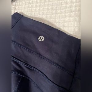 Lululemon navy blue dark leggings flared at bottom, size 0-2